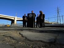 File: Former Los Angeles Mayor Antonio Villaraigosa speaks as U.S. Sen. Barbara Boxer (D-CA) and state and city officials listen on an industrial street with broken pavement at a news conference with with the Sixth Street bridge in the background on October 27, 2011 in Los Angeles, California. 