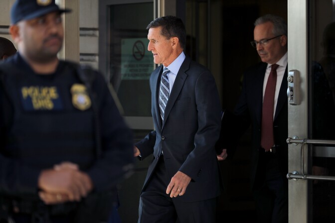 WASHINGTON, DC - DECEMBER 01:  Michael Flynn, former national security advisor to President Donald Trump, leaves following his plea hearing at the Prettyman Federal Courthouse December 1, 2017 in Washington, DC. Special Counsel Robert Mueller charged Flynn with one count of making a false statement to the FBI.  (Photo by Chip Somodevilla/Getty Images)
