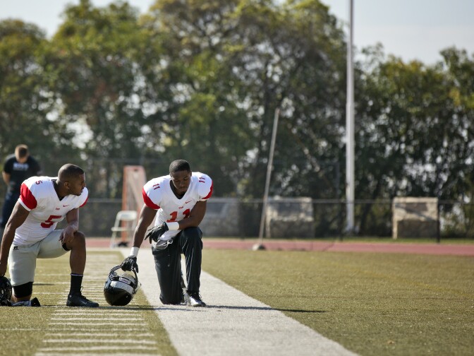 Players take part in an LA Kiss training camp at Whittier College's Memorial Stadium on Tuesday, Feb. 24. The Arena Football League team, co-owned by Gene Simmons and Paul Stanley, will start its first season this March in Anaheim. 