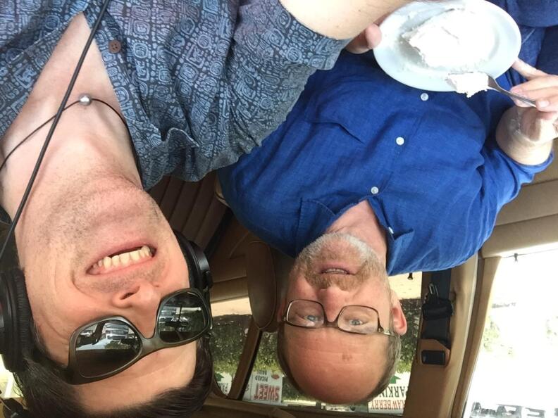 Former LA Times food writer Russ Parsons offers John Rabe a piece of pie, in John's Mercedes