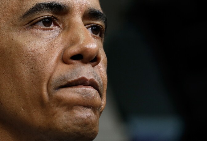 WASHINGTON, DC - JULY 18:  U.S. President Barack Obama answers questions after delivering a statement on the Malaysia Airlines crash over eastern Ukraine in the Brady Press Briefing Room of the White House July 18, 2014 in Washington, DC. Malaysia Airlines flight MH17 travelling from Amsterdam to Kuala Lumpur was allegedly shot down July 17 on the Ukraine/Russia border near the town of Shaktersk.  (Photo by Win McNamee/Getty Images)