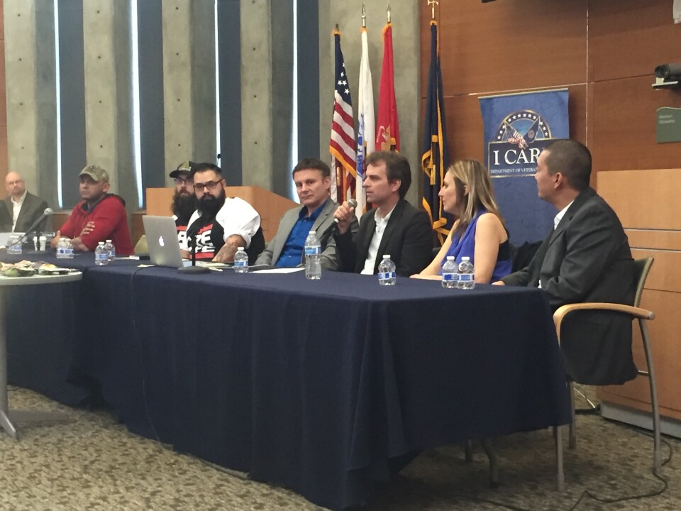 Former Marine sergeant Christian Ellis (in red, to left) and librettist Heather Raffo (second from right) participate in a panel discussion at the VA hospital in Long Beach, Calif. about their upcoming opera 'Fallujah.'