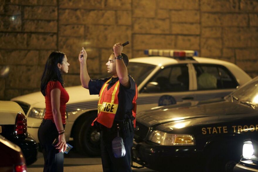 Miami Beach police department conducts a field sobriety test at a DUI traffic checkpoint. On Thursday, February 14, 2013, Senator Correa introduced a bill to make all drugged driving illegal, including prescription drugs without a valid prescription.