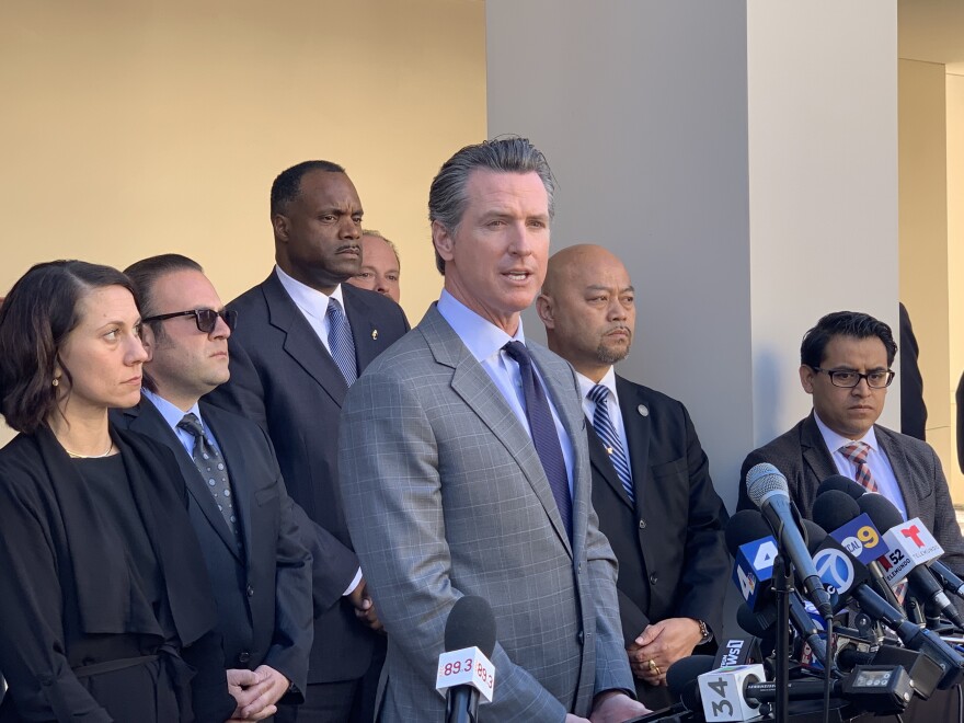Governor Gavin Newsom speaks in Long Beach after meeting with mayors across the state who are not compliant with state housing plans laws.