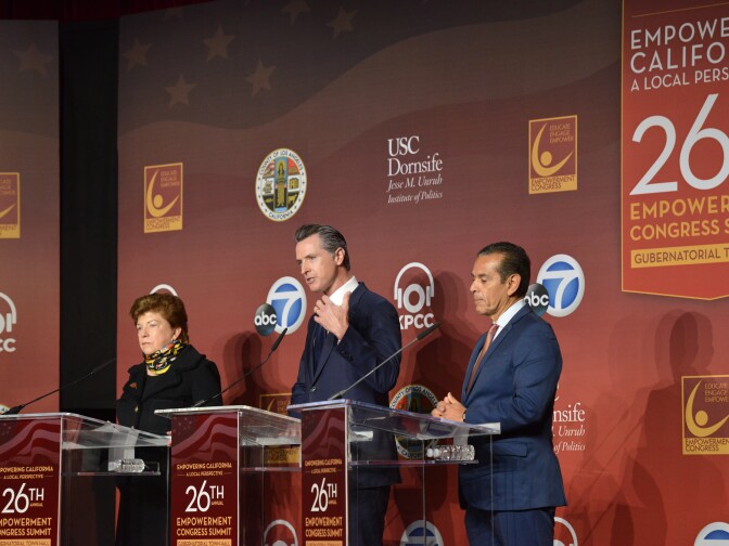 From left, gubernatorial candidates Delaine Eastin, Gavini Newsom and Antonio Villagaigosa on stage at the 26th Annual Empowerment Congress Summit at |USC on Jan. 13, 2018.
