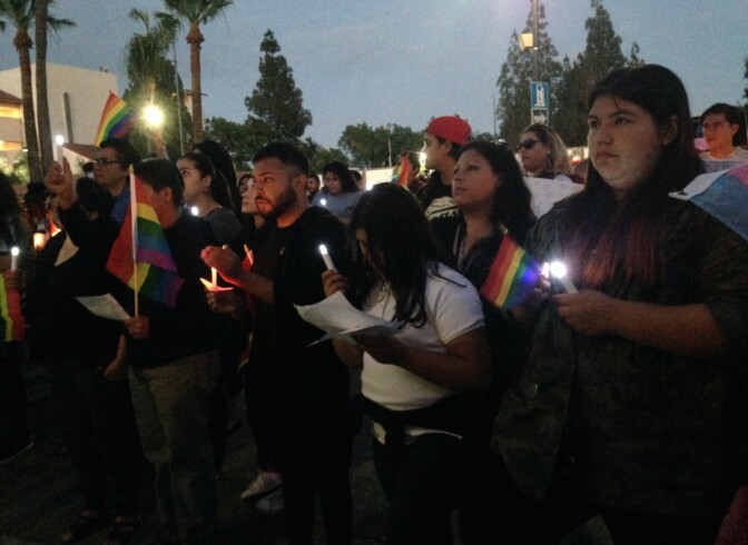 Mourners at a vigil in San Fernando earlier this week for the victims of last weekend's massacre at Pulse, a gay nightclub in Orlando. The vast majority of the victims were Latino. Organizers of the San Fernando vigil and other gatherings say they want to create safe spaces for LGBT Latinos to mourn.