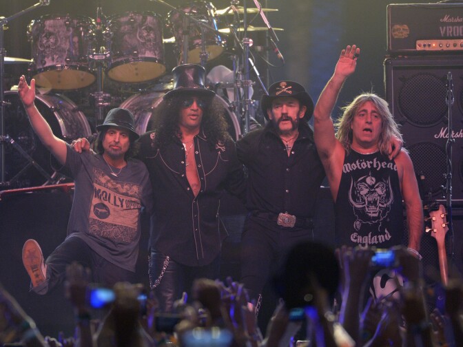 (L-R) Musicians Phil Campbell of Motörhead, Slash, Lemmy Kilmister and Mikkey Dee of Motorhead perform onstage during day 3 of the 2014 Coachella Valley Music & Arts Festival at the Empire Polo Club on April 13, 2014 in Indio, California.