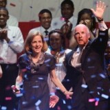 California Governor-elect Jerry Brown with his wife Anne Gust-Brown celebrates his win during an election night party at Fox Theater on November 2, 2010 in Oakland, California. 