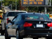 A traffic signs alerts motorists on Interstate 405 of the shutdown one day before workers start demolishing the Mulholland Bridge on Interstate 405 at the Sepulveda Pass during the 11-mile shutdown of Interstate 405 from July 16-18 for 53 hours on July 14, 2011 in Los Angeles. Los Angeles city officials are advising residents to stay home or stay away from the area over the weekend fearing massive traffic jams of what has become known as 'Carmageddon.'