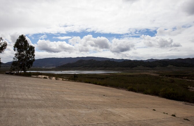 A boat ramp, which used to be submerged in Lake Casitas, now sits dry hundreds of yards from the edge of the water.