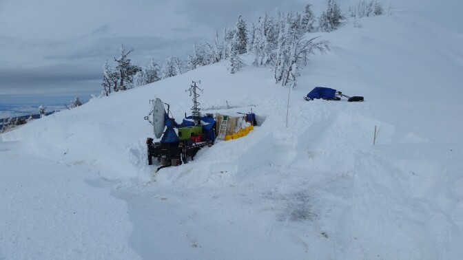 A mobile doppler weather radar based at a mountain top location during the cloud seeding experiment.