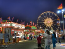 File: Families attend the Los Angeles County Fair.