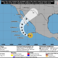 A map and graphic shows the projected path of a hurricane off the coast of Mexico.