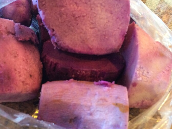 Boiled purple yams, or ube, ready to be grated for the Filipino dish called ube halaya.