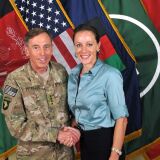 Former CIA Director David Petraeus to teach at USC. In this handout image provided by the International Security Assistance Force (ISAF), former Commander of International Security Assistance Force and U.S. Forces-Afghanistan; CIA Director Gen. Davis Petraeus (L) shakes hands with biographer Paula Broadwell, co-author of "All In: The Education of General David Petraeus" on July 13, 2011. 