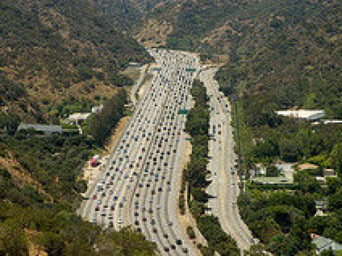 Cars snake through the Sepulveda Pass near the Getty Center on I-405. The stretch is one of the most congested in the country.