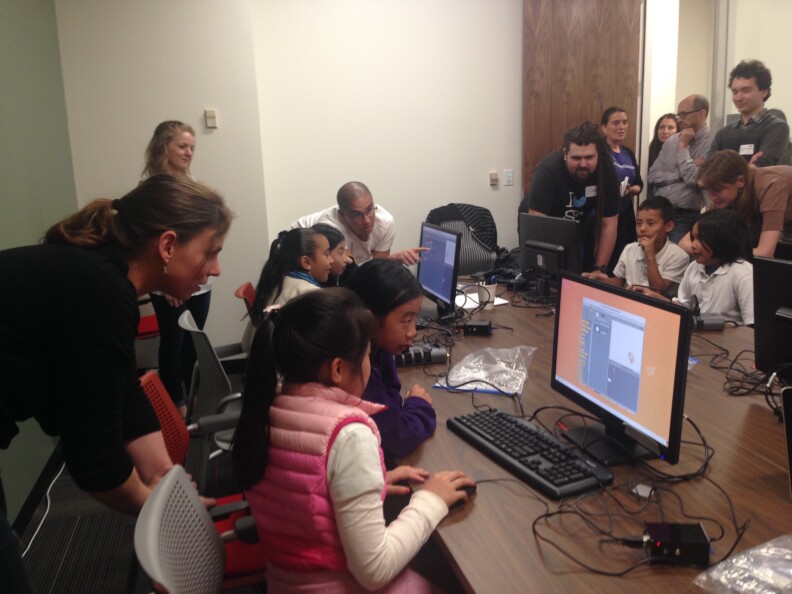 Children learn to code at Twitter's NeighborNest in San Francisco.