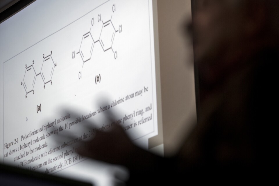 Dr. David Carpenter, head of the Institute for Health and the Environment at the University of Albany in New York, presents his PCB research during the town hall meeting at Pepperdine Law School.The slide shows the molecular structure of polychlorinated biphenyls.