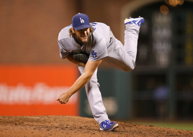 SAN FRANCISCO, CA - SEPTEMBER 29:  Clayton Kershaw #22 of the Los Angeles Dodgers pitches against the San Francisco Giants in the eighth inning at AT&T Park on September 29, 2015 in San Francisco, California.  (Photo by Ezra Shaw/Getty Images)