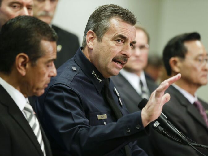 Los Angeles Police Chief Charlie Beck, center, talks about the $1 million reward for accused killer and fired Los Angeles police officer, Christopher Dorner as Los Angeles Mayor, Antonio Villaraigosa, left, and Irvine, Calif., Mayor Steven Choi look on during a new conference at the Los Angeles police department in Los Angeles, Sunday, Feb. 10, 2013. 