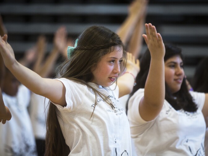 Seventh grader Jackie Zamarripa takes part in the four-day Alvin Ailey Revelations Residency at Rancho Dominguez Preporatory School in Long Beach on Thursday, March 12, 2015. The program is also happening at Glenn Hammond Curtiss Middle School in Carson.
