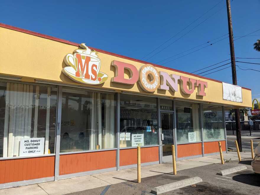 A low-slung, rectangular storefront with the words "Ms. Donut" out front