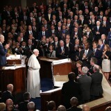 WASHINGTON, DC - SEPTEMBER 24:  Pope Francis is applauded by members of Congress as he arrives to speak during a joint meeting of the U.S. Congress in the House Chamber of the U.S. Capitol on September 24, 2015 in Washington, DC. Pope Francis is the first pope to address a joint meeting of Congress and will finish his tour of Washington later today before traveling to New York City. (Photo by Win McNamee/Getty Images)