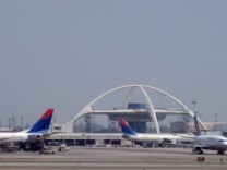 Planes taxiing on the tarmac at the Los Angeles International Airport