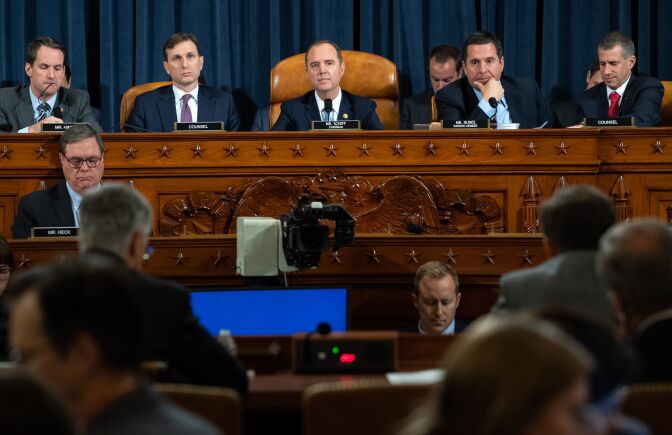 Chairman Adam Schiff (C), Democrat of California, and Ranking Member Devin Nunes (2nd R), Republican of California, during the first public hearings held by the House Permanent Select Committee on Intelligence as part of the impeachment inquiry into US President Donald Trump, with witnesses Ukrainian Ambassador William Taylor and Deputy Assistant Secretary George Kent testifying, on Capitol Hill in Washington, DC, November 13, 2019. - Donald Trump faces the most perilous challenge of his three-year presidency as public hearings convened as part of the impeachment probe against him open under the glare of television cameras on Wednesday. (Photo by SAUL LOEB / POOL / AFP) (Photo by SAUL LOEB/POOL/AFP via Getty Images)