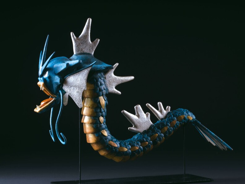 A sculpture of Gyarados, a blue dragon-like creature from Pokemon.