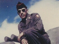 A photo shows a uniformed 'Mac' Ortiz in sunglasses and a military cap perched on a tank.