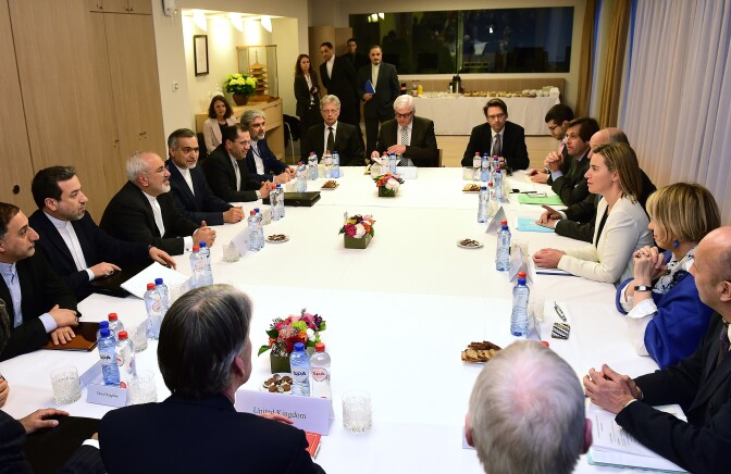 EU Foreign Policy Chief Federica Mogherini (3rd R) and Iran's Foreign Minister Mohammad Javad Zarif (4th L) lead nuclear talks with foreign Ministers from France, Germany and Britain at the European External Action Service (EEAS) headquarters in Brussels on March 16, 2015. AFP PHOTO / EMMANUEL DUNAND

        (Photo credit should read EMMANUEL DUNAND/AFP/Getty Images)