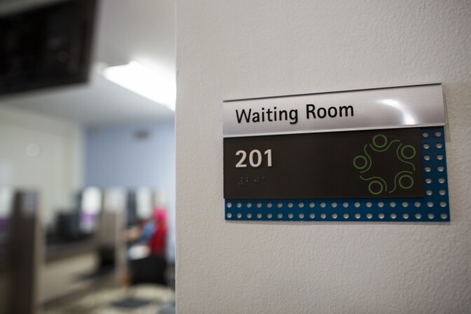 Patients wait inside Saban Community Clinic on Monday afternoon, Dec. 5, 2016.