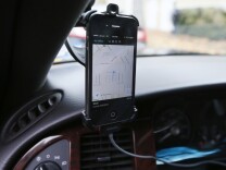 The transportation app Uber matches ride-seekers with drivers.
