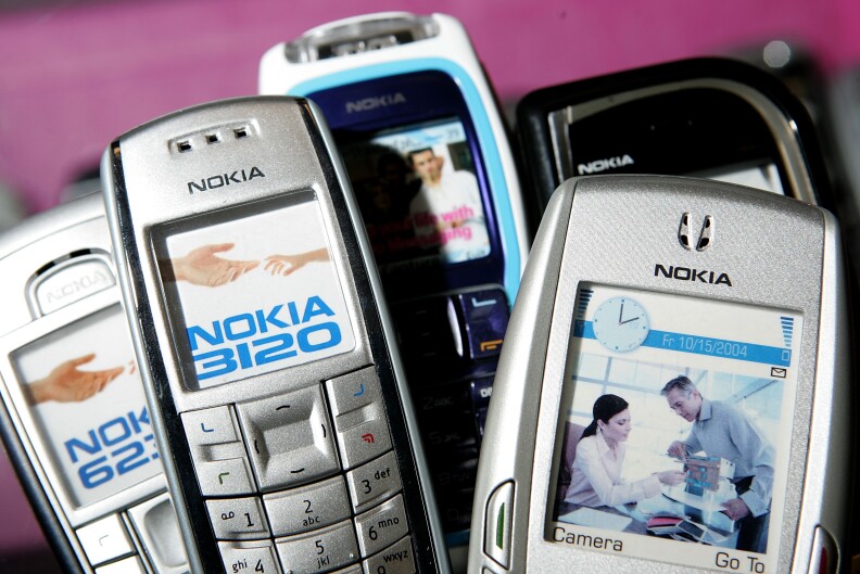 SAN MATEO, CA - AUGUST 08:  Nokia cellular phones are seen on display at wireless store August 8, 2005 in San Mateo, California. Corp. Shares of Finnish mobile phone maker Nokia rose Monday after a report that Cisco Systems Inc. was interested in acquiring the company.  (Photo by Justin Sullivan/Getty Images)