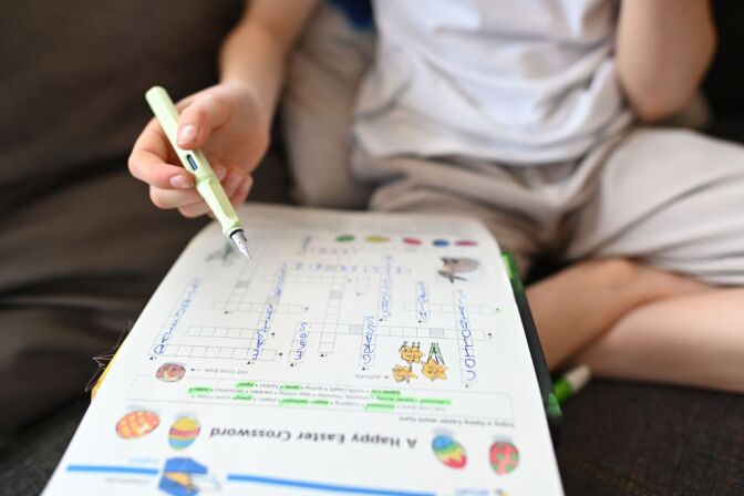LUENEBURG, GERMANY - APRIL 07: Mathilda Franklin, youngest daughter of the photographer, completes her english school homework based on an Easter theme at home on April 7th 2020 in Lueneburg, Germany. The schools have been closed for severaal weeks meaning that all students have to study from home with new work being sent via email daily. The number of confirmed coronavirus cases in Germany has surpassed 100,000 and the number of deaths continues to rise. While public support for the measures imposed by authorities to limit public life in an effort to slow the spread of virus remains strong, people are wondering how long the measures will last, especially as the economic impact of the disruptions becomes more acute. (Photo by Stuart Franklin/Getty Images)