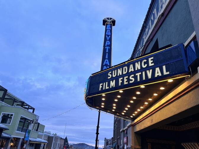 A blue marquee on a building with the words "Sundanvce Film Festival"