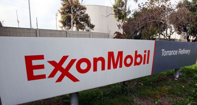 The ExxonMobil oil refinery in Torrance was evacuated Thursday after a power outage caused an automatic system reset that sent up a huge flare of smoke and flame from a burn-off pipe. (Photo: ExxonMobil oil refinery entrance in Torrance, Calif. AP Photo/Reed Saxon)