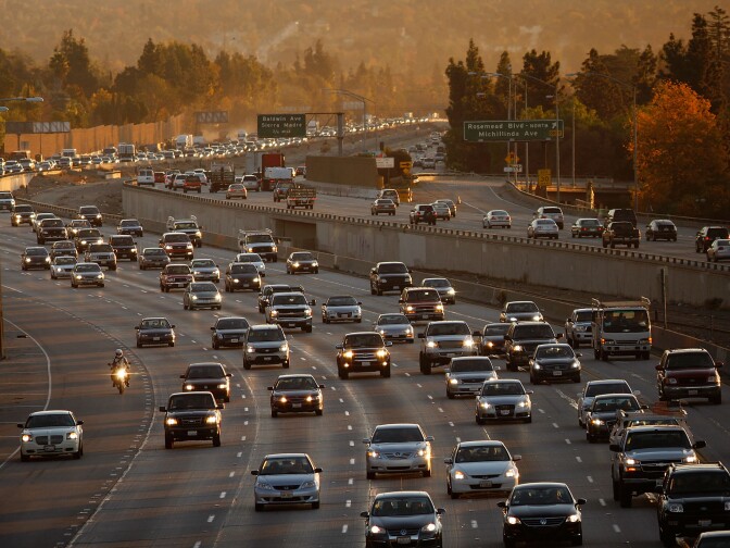 PASADENA, CA - DECEMBER 1:  Morning commuters travel the 210 freeway between Los Angeles and cities to the east on December 1, 2009 near Pasadena, California. President Barack Obama will attend the international climate negotiations in Copenhagen next week with a vow to reduce US greenhouse gas emissions to about 17 percent below 2005 levels by 2020, and 83 percent by 2050. Meanwhile, California, which has some of the toughest clean air laws after decades of fighting some of the worst smog in the nation, is in the final phase of building a cap-and-trade market to provide incentives to reduce greenhouse emissions.  More than 60 world leaders are expected to take part in the climate negotiations in Copenhagen.   (Photo by David McNew/Getty Images)