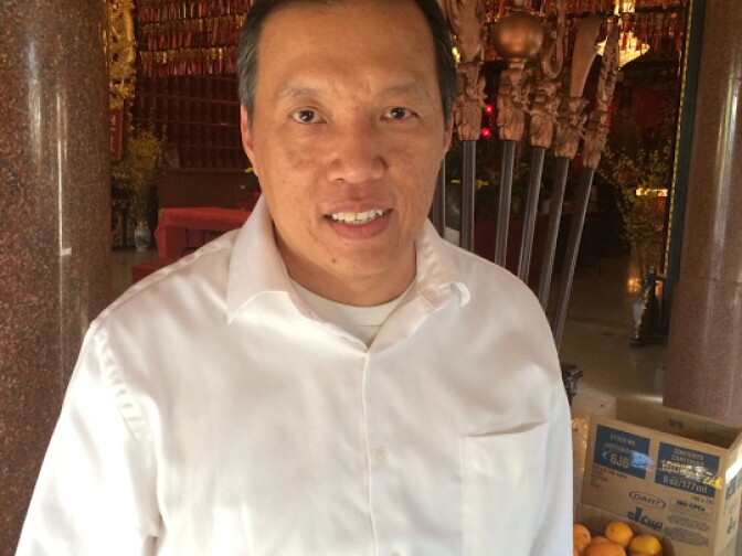 Vincent Fang poses outside the Chua Thien Hau Temple in LA's Chinatown. 