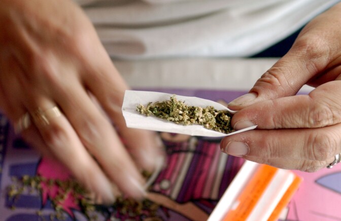 SAN FRANCISCO - JULY 25:  Staarla Heaney hand rolls marijuana cigarettes at the San Francisco Patients Cooperative, a medical cannabis cooperative, July 25, 2002 in San Francisco, California. A San Francisco city supervisor has drafted a proposal allowing voters in San Francisco to decide whether the city should consider getting into the marijuana growing business. Supervisor Mark Leno said he drafted the proposal because the Drug Enforcement Administration remains determined to close down clubs that distribute medical marijuana in San Francisco and other parts of California.  (Photo by Justin Sullivan/Getty Images)  