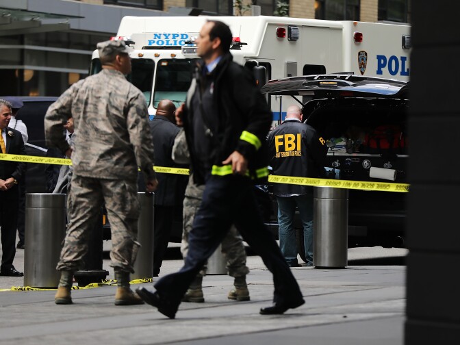 NEW YORK, NY - OCTOBER 24:  Police, FBI and other emergency workers gather outside the Time Warner Center after an explosive device was found this morning on October 24, 2018 in New York City. CNN's office at the center was evacuated after a package arrived that was similar to suspicious packages found near the homes of Bill and Hillary Clinton, the Obamas and billionaire philanthropist George Soros.  (Photo by Spencer Platt/Getty Images)