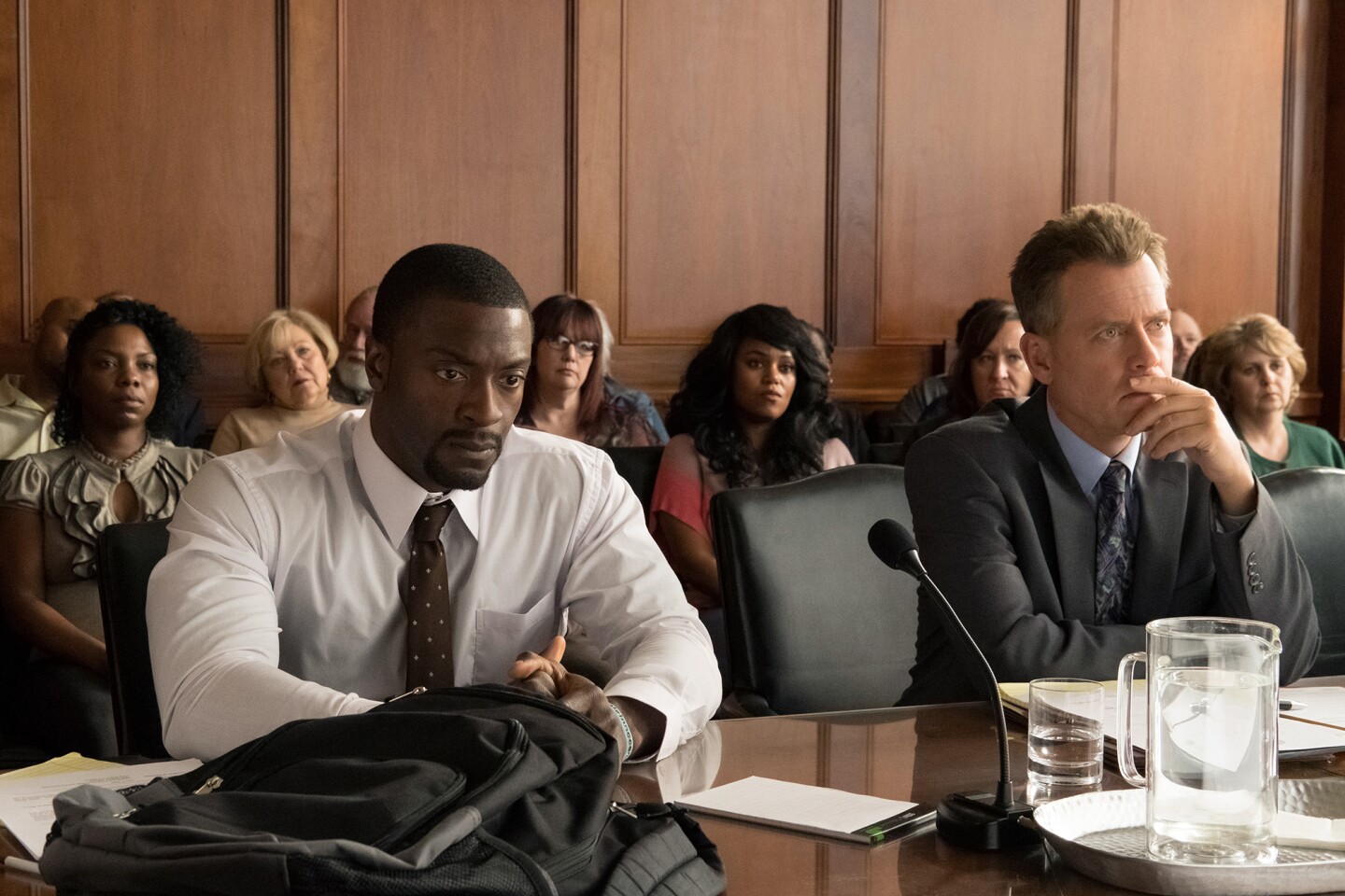 Aldis Hodge (left) as Brian Banks and Greg Kinnear (right) as Justin Brooks in "Brian Banks." 