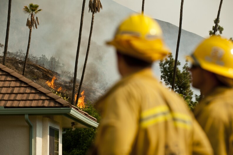 Firefighters work to fight the Colby Fire in the mountains near Glendora on Thursday. The blaze has burned 1,700 acres so far according to LA County Fire as of 10:07 a.m. on Thursday. 
