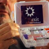 Dr Philip Nitschke holds up a drug testing kit which is used as part of assisted suicides following a workshop on the subject on May 5, 2009 in Bournemouth, England.