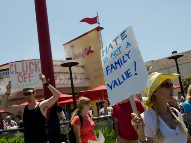 Protesters made a variety of homemade signs showing their feelings about Chick-fil-a's values.