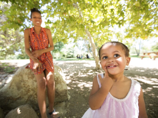 Stephanie Williams, 20, and her daughter Kylee Lewis, 2, in Vista Hermosa Natural Park in Los Angeles on 20th June 2016. Stephanie earned her high school diploma this June through Project NATEEN at Children's Hospital Los Angeles
