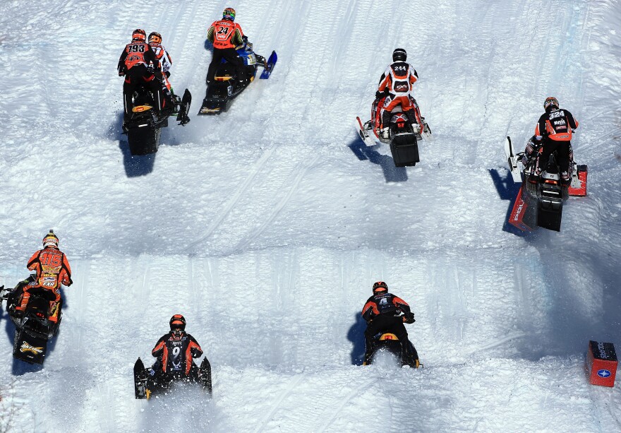 ASPEN, CO - JANUARY 27:  Racers compete in the first round of Snowmobile Snocross at Winter X Games Aspen 2013 at Buttermilk Mountain on January 27, 2013 in Aspen, Colorado.  (Photo by Doug Pensinger/Getty Images)