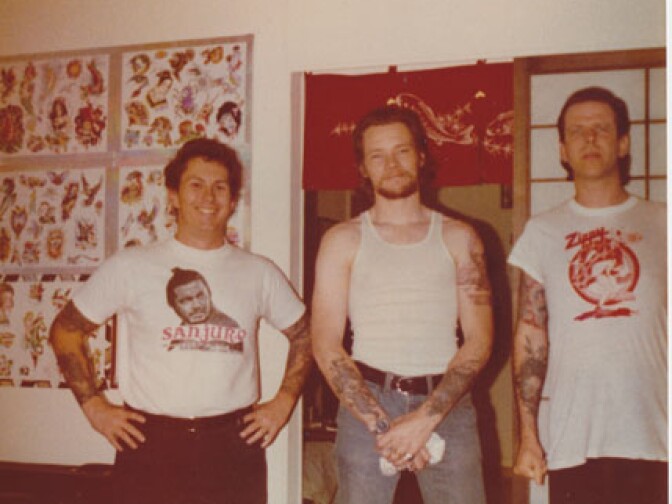 Tattoo artists (L-R) Don Ed Hardy, Jack Rudy, and Bob Roberts exchanged ideas and tricks of the tattoo trade in the late 1970s. 