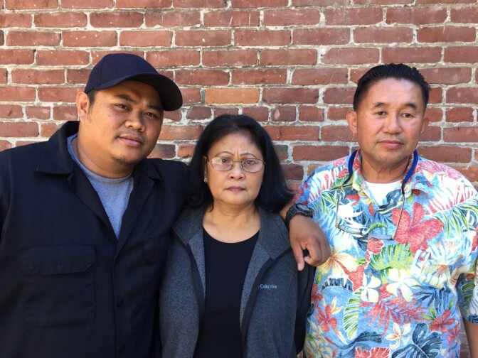 The family of a Mharloun Saycon, a man shot and killed by Long Beach Police officers, is filing a claim against the department. Pictured from left to right: brother, Khanly Saycon II, mother, Anna Luz Saycon, and father, Khanly Saycon, Jr.

 